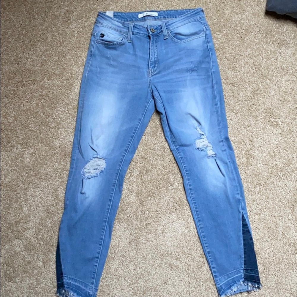 Distressed light wash stretchy skinny jeans